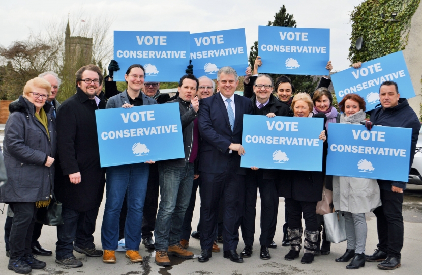 Brandon Lewis with the Bolton Team